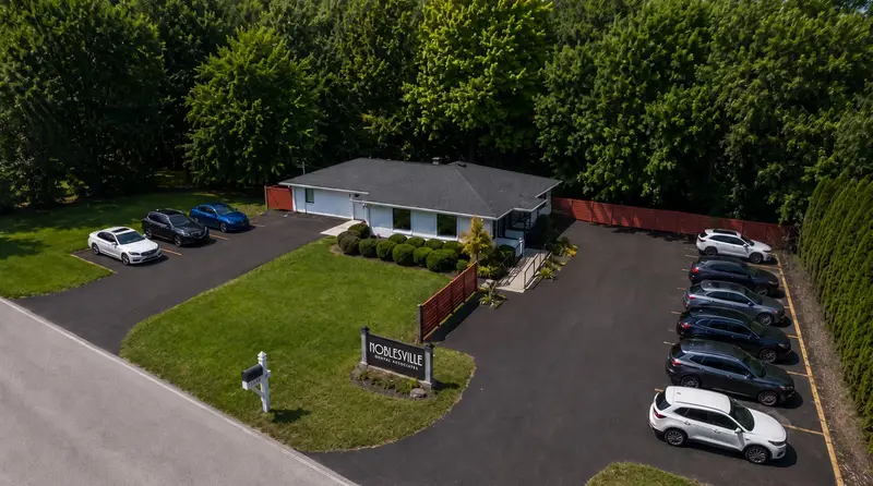 Aerial view of the Noblesville Dental Associates office and parking lot at 17567 River Road